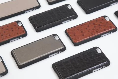 Leather phone case craftsmanship work on the white background. Foto stock