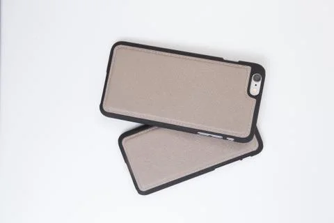 Leather phone case craftsmanship work on the white background. Foto stock