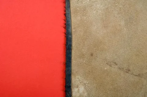 Leather on red paper 스톡 사진