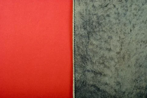 Leather on red paper Stock Photos