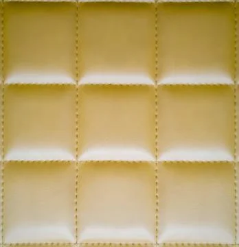 Leather seats, square pattern, brown. Stock Photos