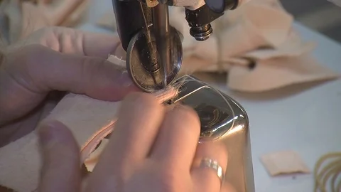 Leather sewing with a sewing machine.The Process Of Making Shoes Stock Footage 90272476