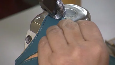 Leather sewing with a sewing machine.The Process Of Making Shoes Stock Footage 90275395