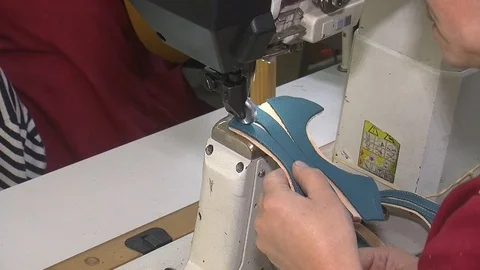 Leather sewing with a sewing machine.The Process Of Making Shoes Stock Footage 90275445