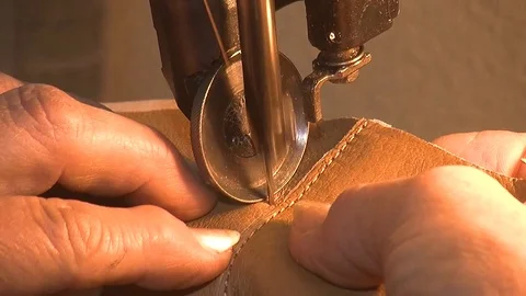 Leather sewing with a sewing machine.The Process Of Making Shoes Stock Footage 90276927