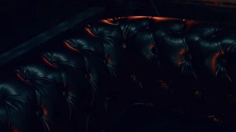 Leather sofa in the dim light Stock Footage 70275729