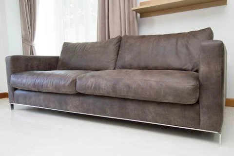 Leather sofa in modern living room Stock Photos