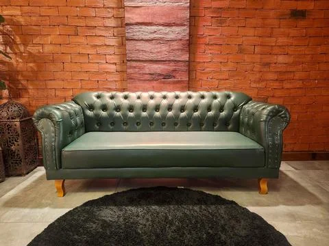 Leather sofa in a modern setting Stock Photos
