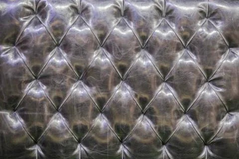 Leather sofa texture background. ?he black gray quilted leather pattern. Leat Stock Photos