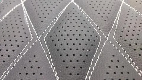 Leather stitched with perforated pattern, Stock Photos