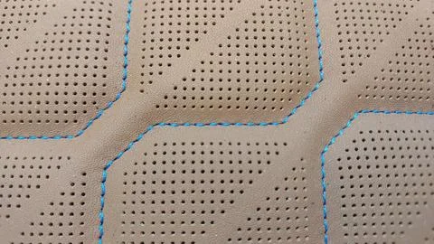 Leather stitched with perforated pattern, Stock Photos