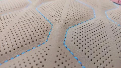 Leather stitched with perforated pattern, Foto stock