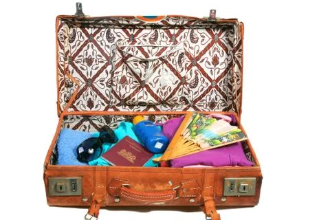 Leather suitcase packed for vacation Foto stock