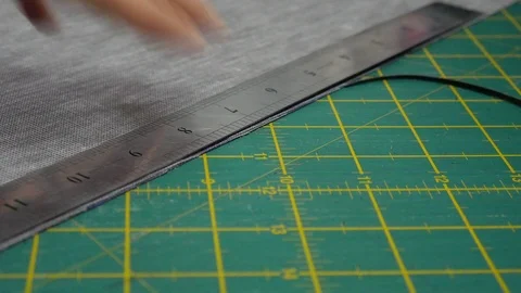 Leather tailor is working with her handmade product Stock Footage 101035484