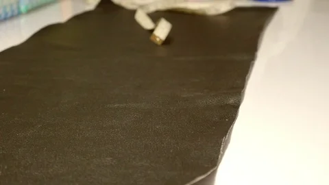 Leather tailor is working with her handmade product Video stock 101035509