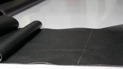 Leather tailor is working with her handmade product Video stock 101035526