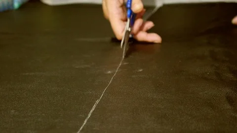 Leather tailor is working with her handmade product Video stock 101035530