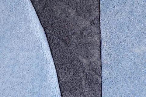 Leather texture as background. Grained, texture closeup. Stock Photos
