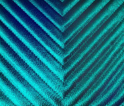 Leather texture with seams, zigzag. Green teal colors. Stock Illustration