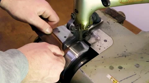 Leather thinning with a machine Stock Footage 154361045