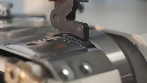 Leather thinning with a machine. A tanner pats a leather blank. Close-up. Stock Footage 104925654