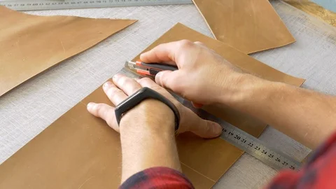 Leather workshop process, cutting leather Stock Footage 118135251