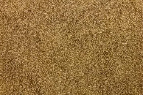 Leatherette. The texture is brown. Stock Photos