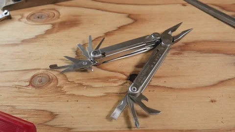 Leatherman Wave multitool on workbench Stock Footage 140624022