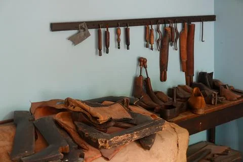 Leatherworker’s Bench with Vintage Tools Stock Photos