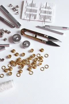 Leatherworking tools and hardware installation on light background Stock Photos