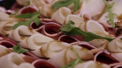 Leaves of arugula and lean ham Stock Footage 49117164