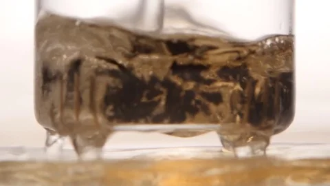 Leaves of green leaf tea brewed in teapot. Close ups Vidéo 73849183