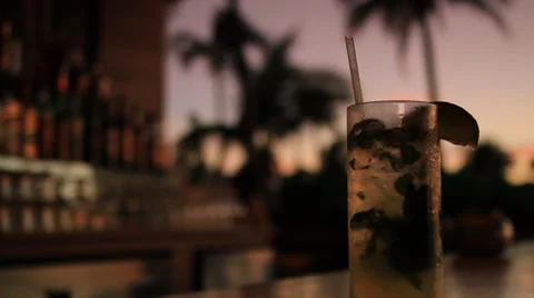 Leaving the bar with Drink - Sunset - Close up Stock Footage 34818544