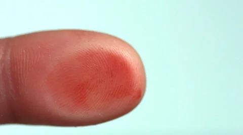 Leaving a bloody finger print on a surface Stock Footage 35251061