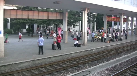 Leaving a Chinese train station 動画素材 7749932