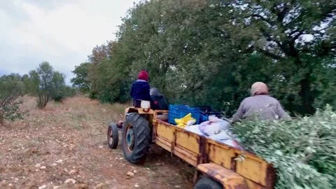 Leaving the farm on a tracker Stock Footage 171043240