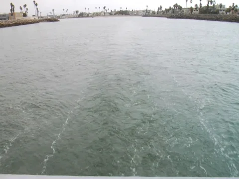 Leaving Harbor - Stern of Boat Stock Footage 79733093