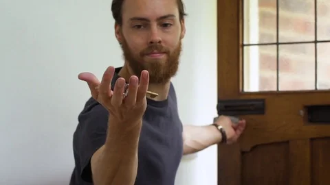 Leaving House Key Throw Stock Footage 80000813