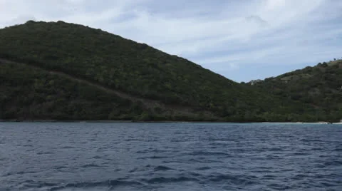 Leaving the island, pan Stock Footage 23830996