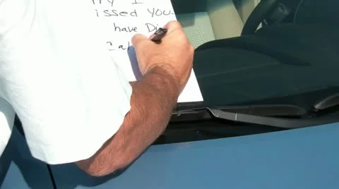 Leaving Note Under Windshield - Significant Other 動画素材 12592703