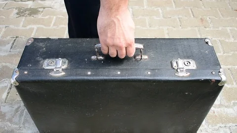 Leaving with a suitcase Stock Footage 108138942