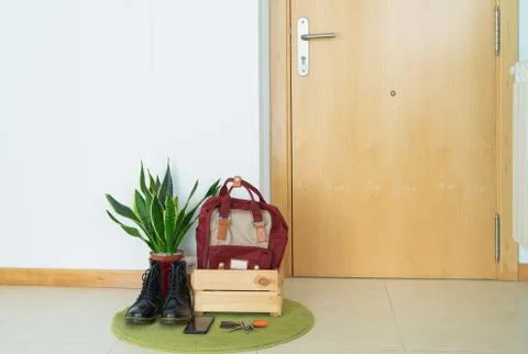 Leaving things when you get home, keys and cell phone in a wooden box. COVID- Stock Photos
