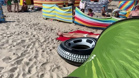 Łeba Beach During Summer Holiday on August 13, 2024 Stock Footage 281874879