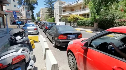 Lebanese queue for hours in Beirut to get 10 litres of gas Stock Footage 170448478