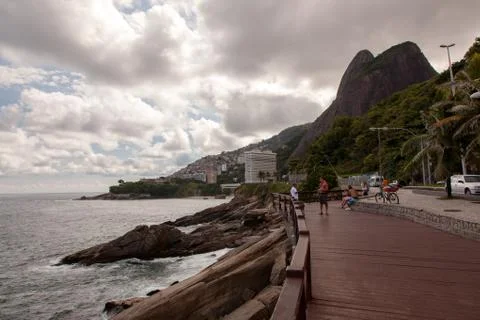 Leblon beatch deck on Rio de Janeiro with two brothers mountains on backgroun Stock Photos