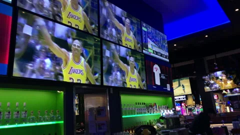 Lebron James Passes Kareem As NBA Leading Scorer on Tv's in Sports Bar Stock Footage 232623489