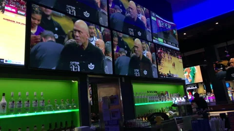 Lebron James Passes Kareem As NBA Leading Scorer on Tv's in Sports Bar Stock Footage 232624268