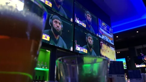 Lebron James Passes Kareem As NBA Leading Scorer on Tv's in Sports Bar Stock Footage 232630469