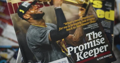 LeBron James wins NBA Title for Cleveland, Cover of Sports Illustrated Stock Footage 146354099