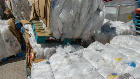 Lecanto, FL - 3/20/22: Plastic bundled for recycling at a Walmart. 4K 動画素材 172415530